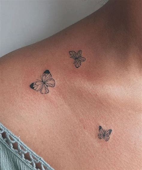 collar bone small butterfly tattoo on chest|15 Small Butterfly Tattoo Designs for the Chest